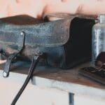 black leather bag close-up photography