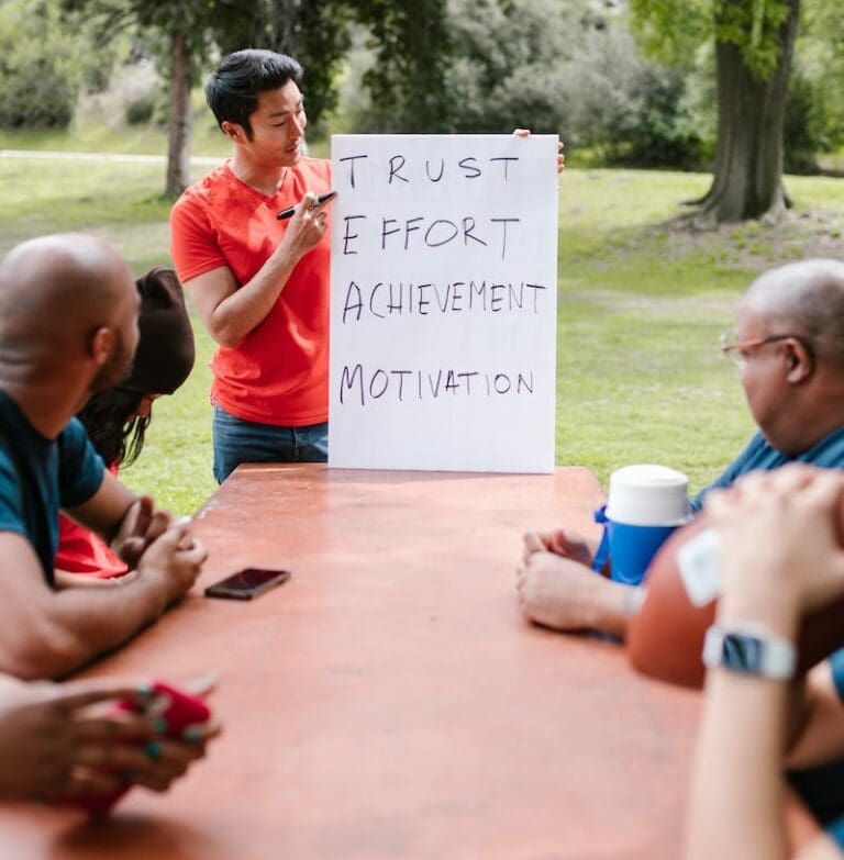 Man Speaking To A Group On Team Building