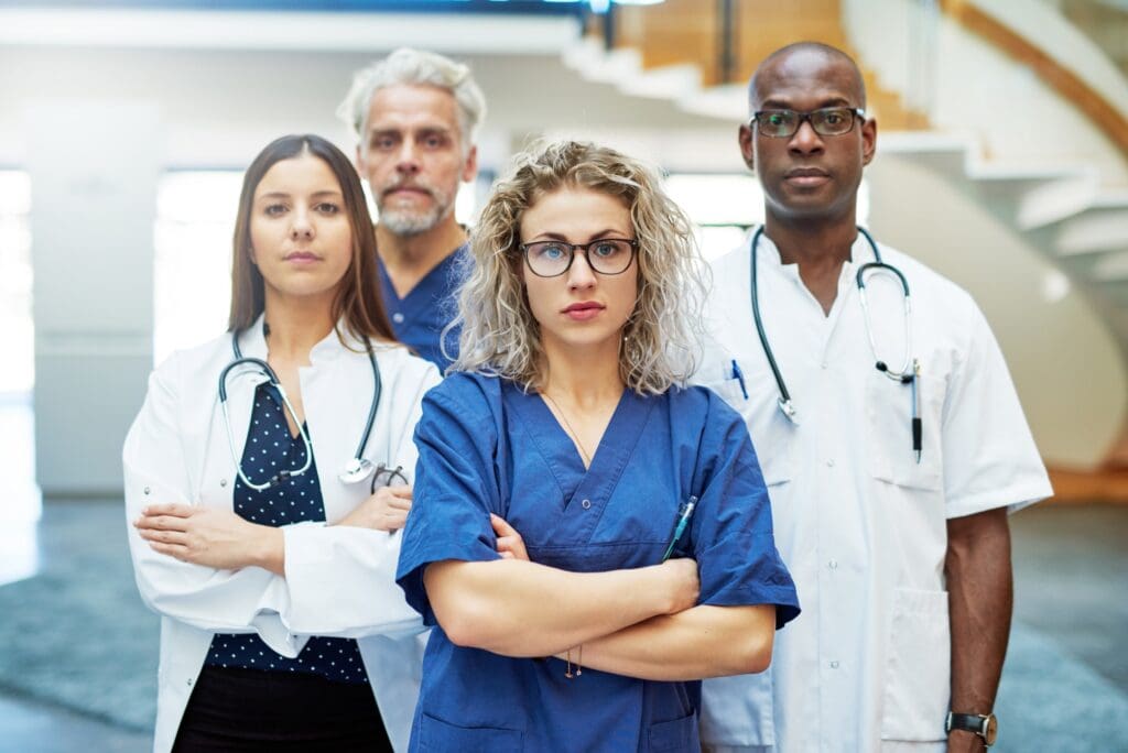Healthcare system workers standing in a clinic