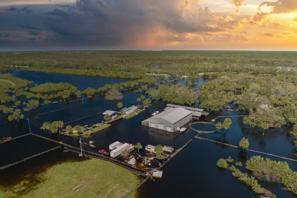 Consequences of natural disaster. Flooded industrial business warehouse by hurricane