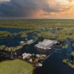 Consequences of natural disaster. Flooded industrial business warehouse by hurricane