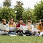 College students working together in the park
