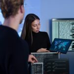 Cyber security team working in a Cyber Security Operations Center SOC to protect systems and