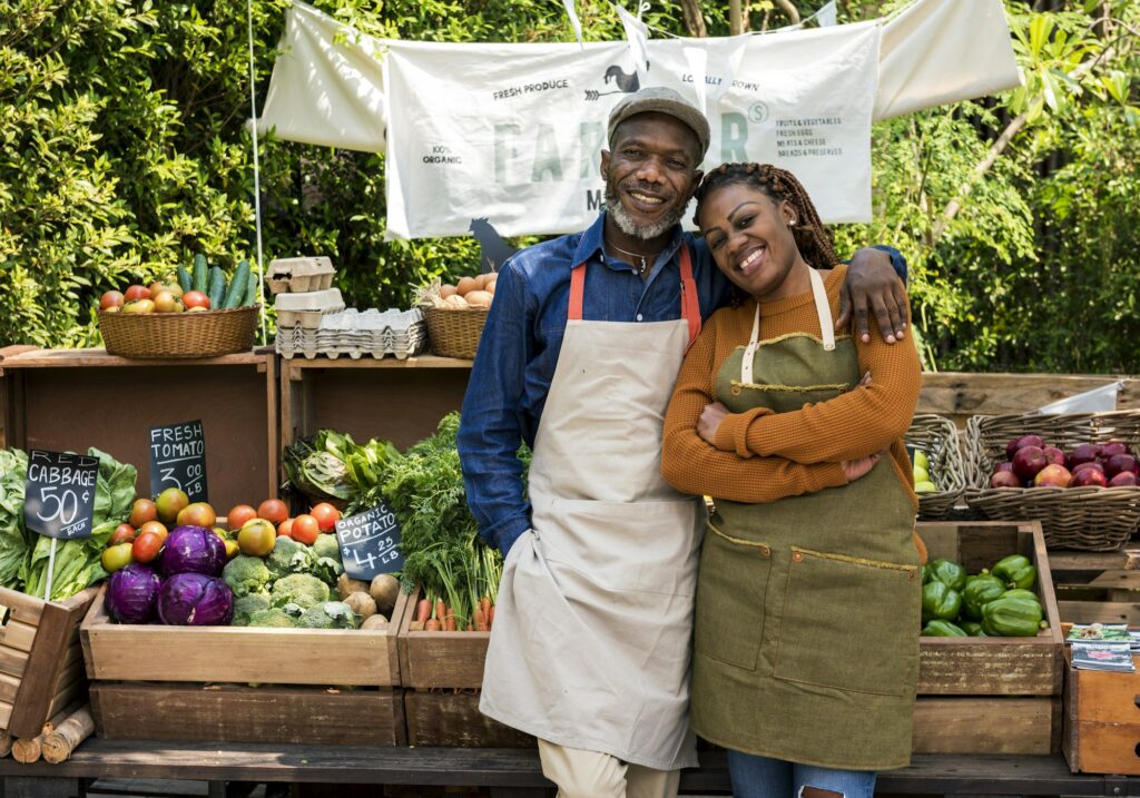 Greengrocer selling organic fresh agricultural product at farmer market help with User Generated Content