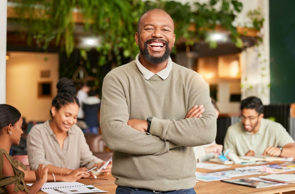 Why Is It Important to Be a Leader?   portrait smile and arms crossed in leadership for meeting, teamwork or brainstorming at