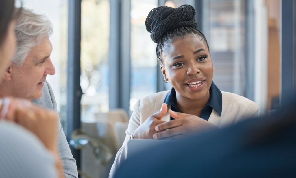 Black woman, leadership and meeting for business idea, planning or strategy at the office. African