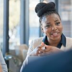 Black woman, leadership and meeting for business idea, planning or strategy at the office. African