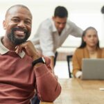 Leadership, smile and portrait of black man in office for business, project management and mindset.
