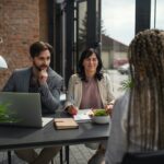 Rear view of young woman having job interview in office, business and career concept