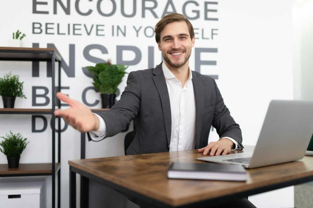 HR manager welcomes a new employee in the office