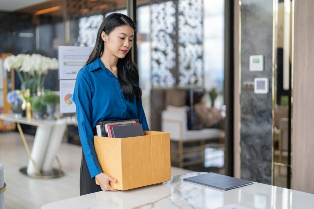 Quit Job asian business woman sending resignation letter and packing Stuff Resign Depress