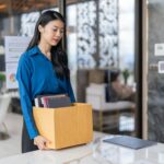 Quit Job asian business woman sending resignation letter and packing Stuff Resign Depress