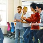 Diverse Group of Colleagues Participating in Team-Building Activity