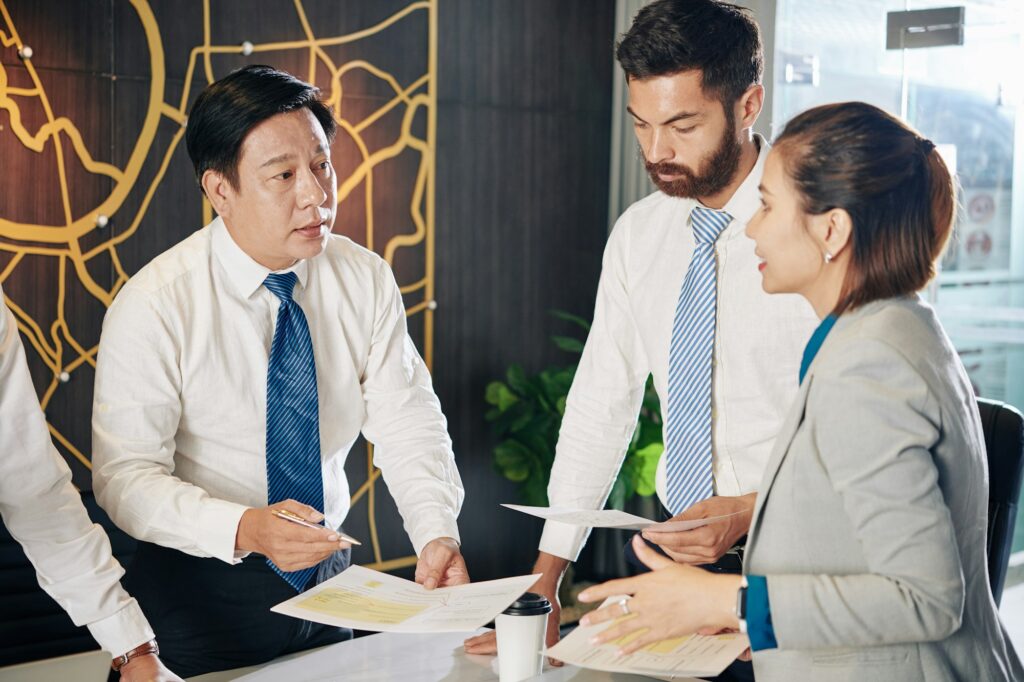 Entrepreneur talking to his team of individual contributors