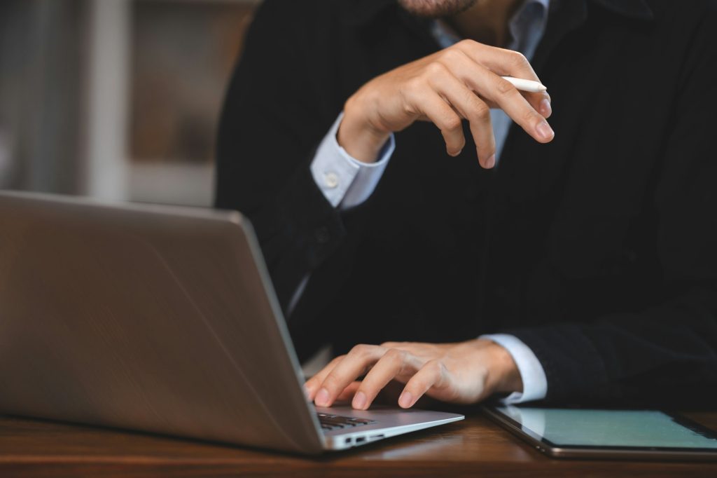 Young Businessman Working in Office: An Entrepreneur Manages Online Selling