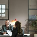Manager listening to candidate at interview