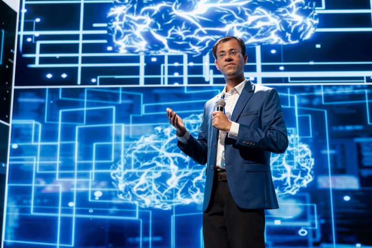 Expert talking at artificial intelligence tech summit event gathering professionals