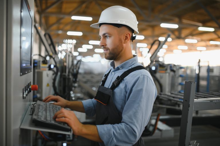 Factory worker. Man working on the production line.