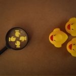 Group of toy ducks with cooperation symbols.Plan management and analyze in head