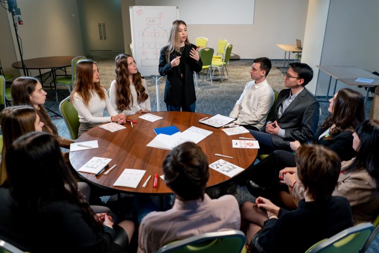 business conference or meeting at the hotel the manager tells colleagues the development plan