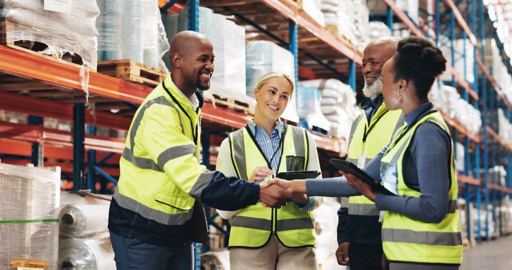 Business people, handshake and logistics with tablet for meeting in supply chain, distribution or s