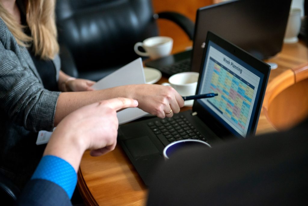 business people working with laptop, week planning