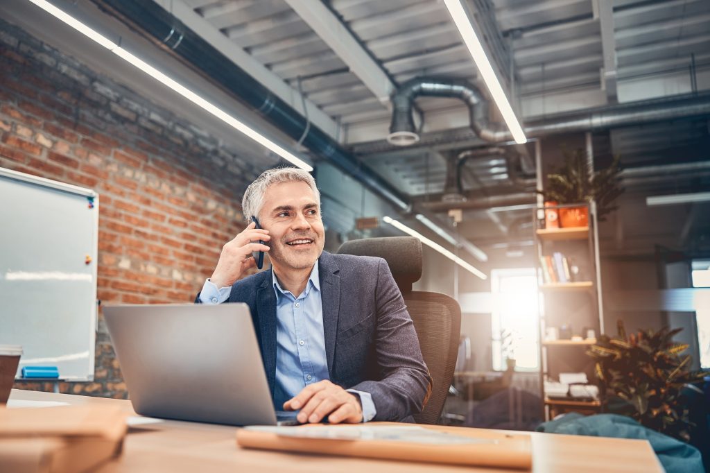 Founder of company enjoying good working day