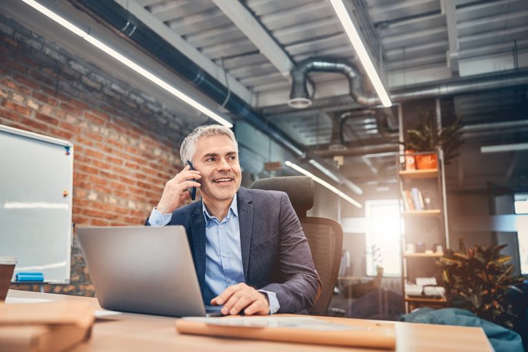 Founder of company enjoying good working day