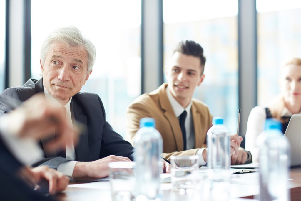 Intelligent business people listening to lecture